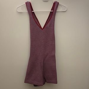 RE/DONE Danskin knit romper with criss-cross back straps